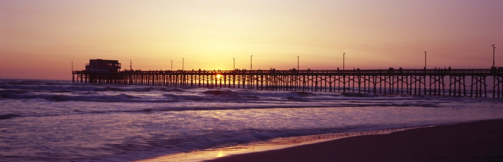 Pier over the ocean at dusk Newport Pier Newport Beach Orange County California USA Canvas Art - Panoramic Images (27 x 9)