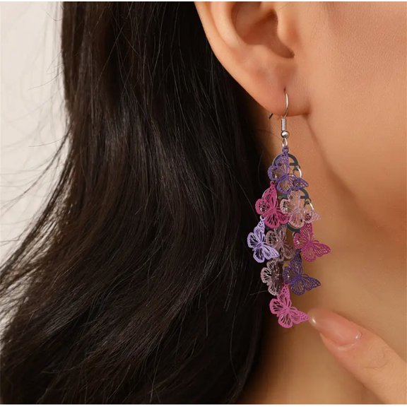 Pierced 2 1/2" silver and purple butterfly layered dangle earrings