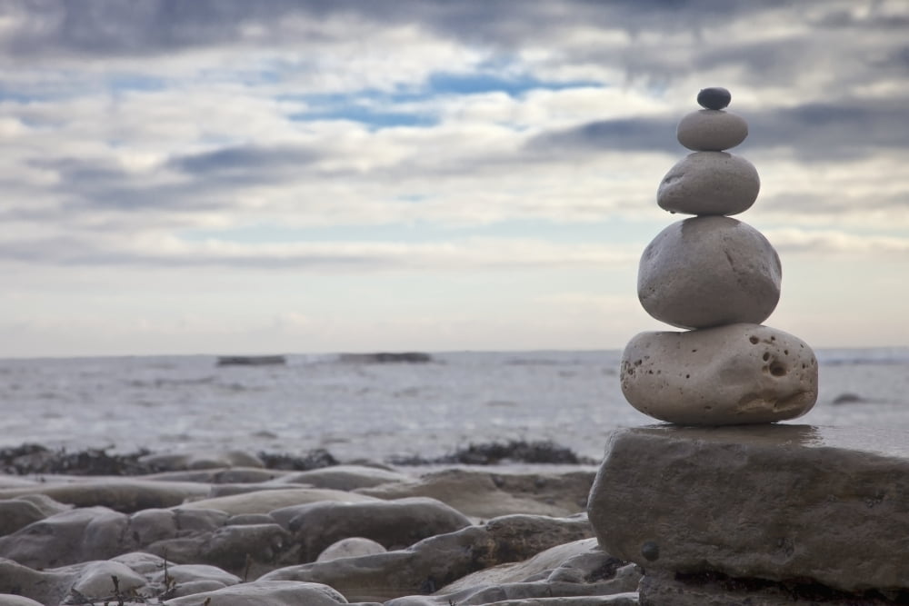 Pile Of Rocks Balanced On A Boulder At The Waters Edge South Shields Tyne And Wear England Canvas Art - John Short Design Pics (19 x 12)