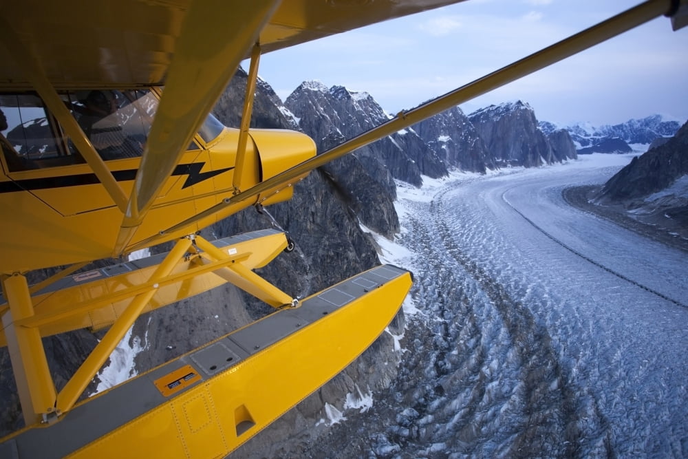 A Pilot Flies His Super Cub Floatplane Over The Ruth Glacier Valley With Alaska Range In The Background Summer Southcentral Alaska Canvas Art - Jeff Schultz Design Pics (34 x 22)