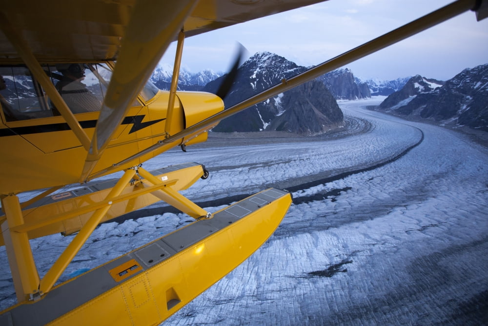 A Pilot Flies His Super Cub Floatplane Over The Ruth Glacier Valley With Alaska Range In The Background Summer Southcentral Alaska Canvas Art - Jeff Schultz Design Pics (34 x 22)