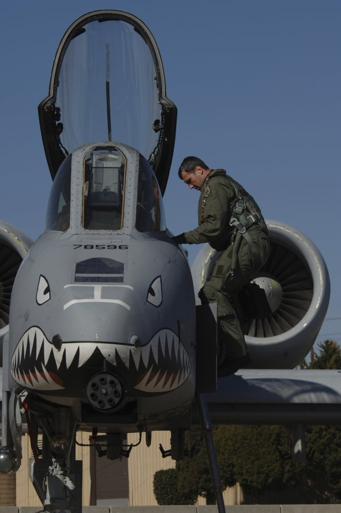 Pilot climbs down from an A-10 Thunderbolt Canvas Art - Stocktrek Images (23 x 34)