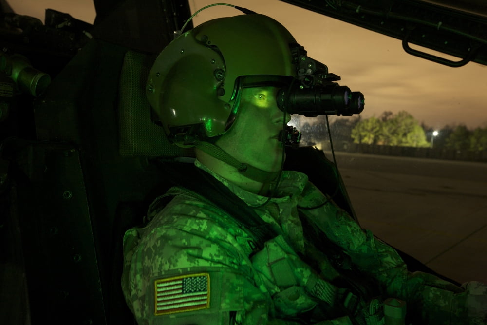 Pilot equipped with night vision goggles in the cockpit of an Apache helicopter Canvas Art - Terry MooreStocktrek Images (18 x 12)