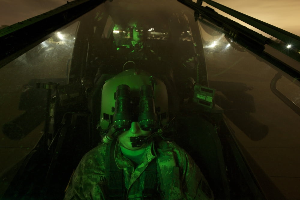 Pilot equipped with night vision goggles in the cockpit of an Apache helicopter Canvas Art - Terry MooreStocktrek Images (35 x 23)