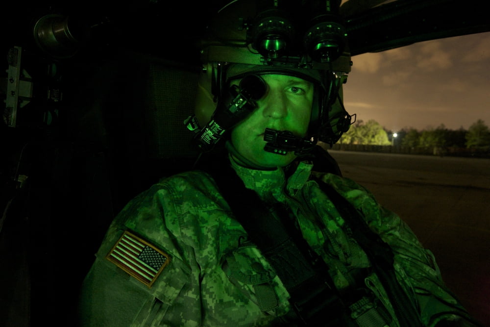 Pilot equipped with night vision goggles in the cockpit of an Apache helicopter Canvas Art - Terry MooreStocktrek Images (35 x 24)