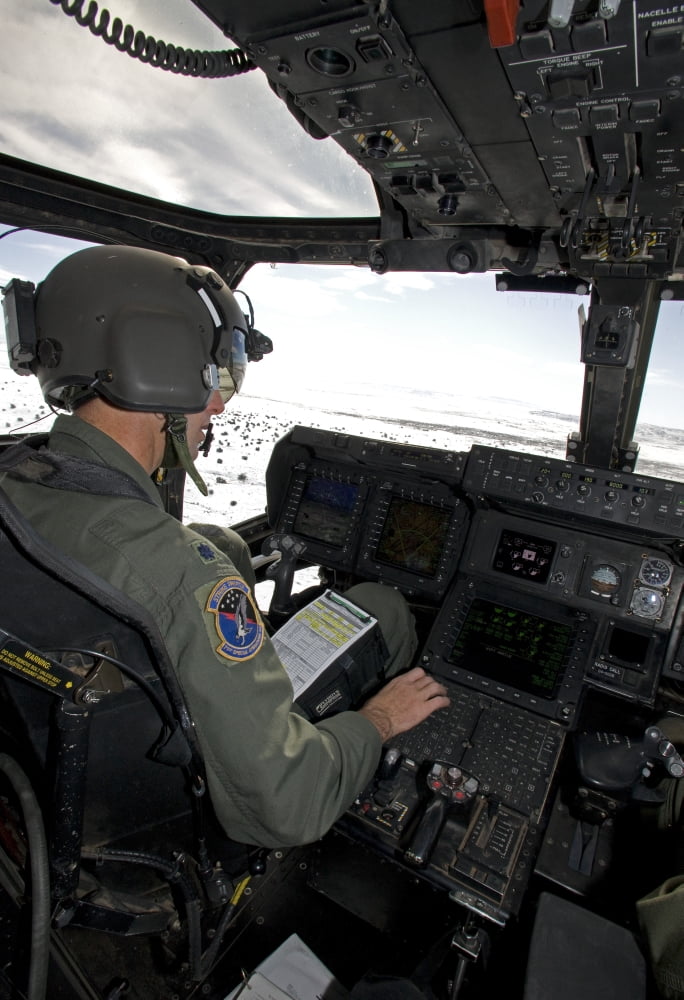 Pilot of a CV-22 Osprey goes over his instruments in the cockpit Canvas Art - HIGH-G ProductionsStocktrek Images (24 x 34)