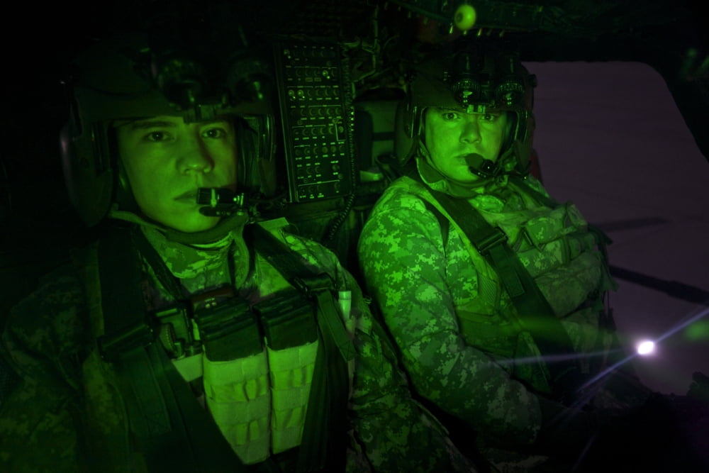 Pilots in the cockpit of an OH-58D Kiowa helicopter Canvas Art - Terry MooreStocktrek Images (18 x 12)