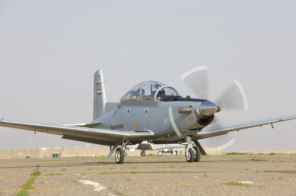 Pilots perform a pre-flight on their T-6 Texan trainer aircraft Canvas Art - Terry MooreStocktrek Images (18 x 12)