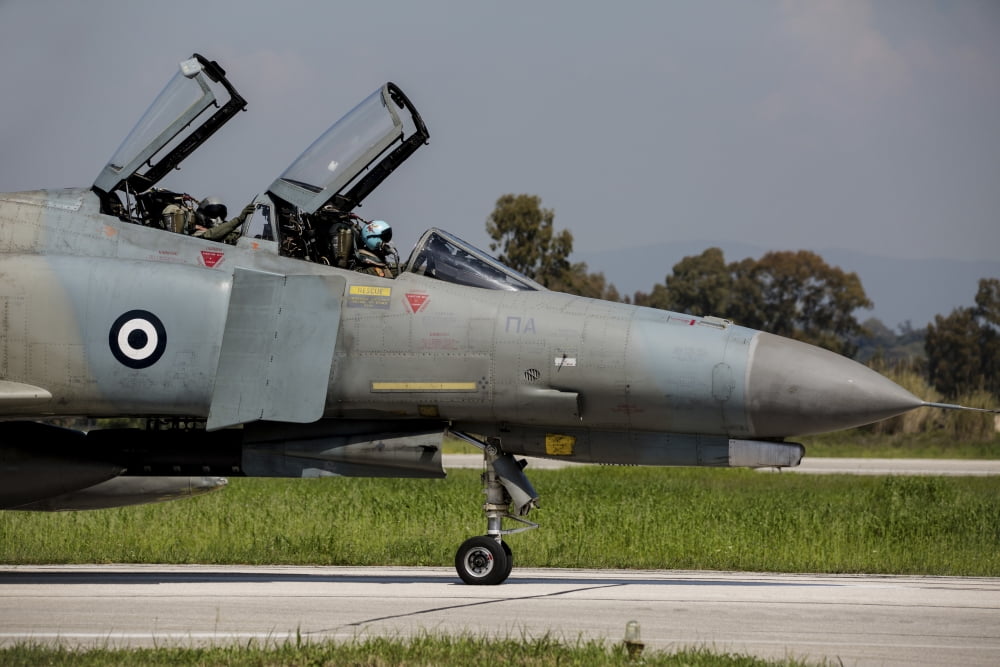 Pilots sitting in the cockpit of a Hellenic Air Force F-4E Phantom Canvas Art - Timm ZiegenthalerStocktrek Images (17 x 12)