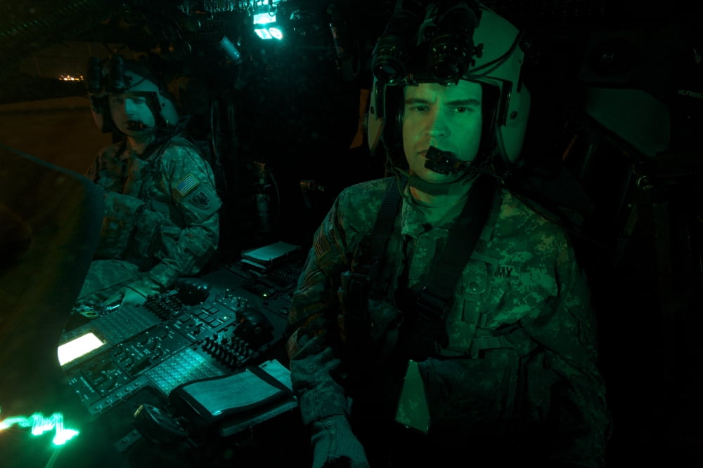 Pilots sitting in the cockpit of a UH-60 Black Hawk helicopter Canvas Art - Terry MooreStocktrek Images (18 x 12)