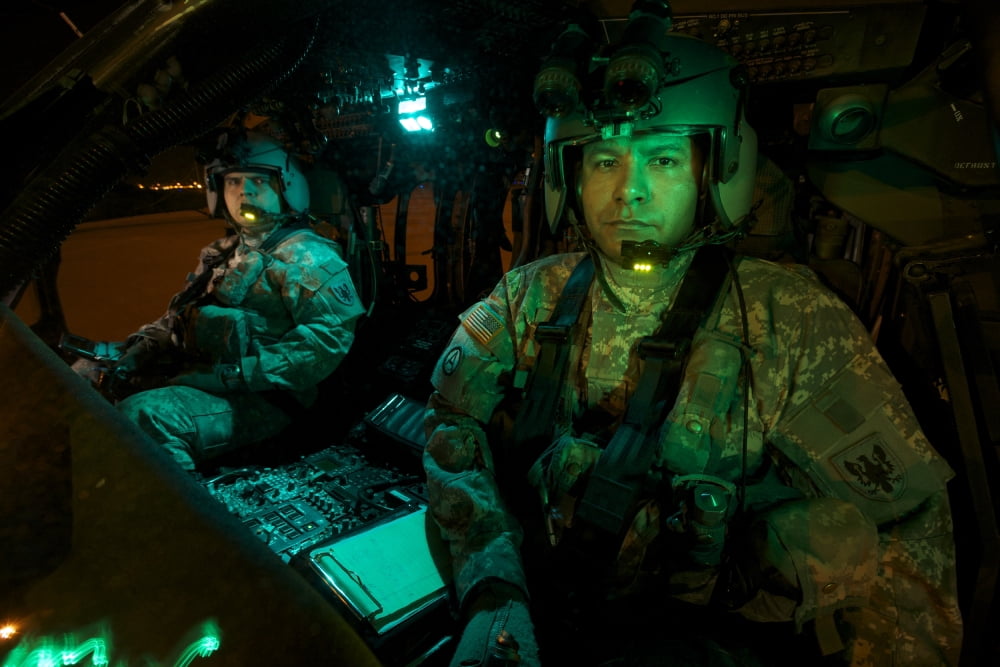 Pilots sitting in the cockpit of a UH-60 Black Hawk helicopter Canvas Art - Terry MooreStocktrek Images (18 x 12)