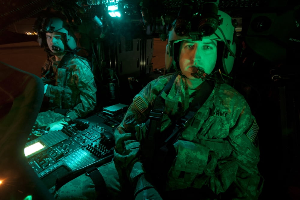 Pilots sitting in the cockpit of a UH-60 Black Hawk helicopter Canvas Art - Terry MooreStocktrek Images (18 x 12)