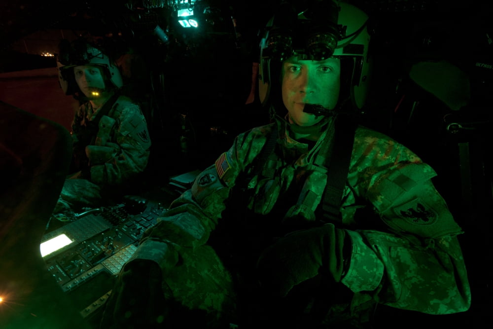 Pilots sitting in the cockpit of a UH-60 Black Hawk helicopter Canvas Art - Terry MooreStocktrek Images (18 x 12)