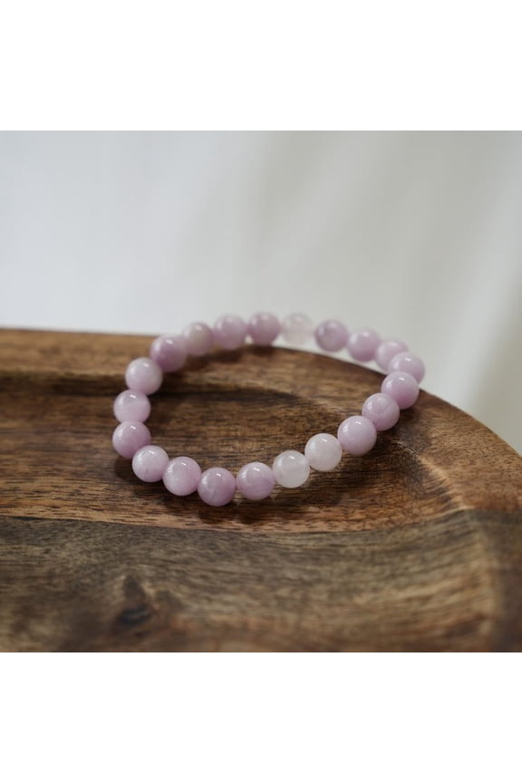 Pink Kunzite Bracelet for Love and Growth Crystal: Natural Kunzite Type: Beaded Stretch Bracelet Bead Size: 8 MM Bracelet Size: 7 Inches Wrist Size Range: 6 to 7 Bead Shape: Round | Stone Be