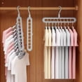 thumbnail image 1 of Pink Nine-Hole Hanger, Multifunctional Folding Clothes Rack for Travel and Household Drying Organization, Magic Storage Gadget, Professional Grade Household Maintenance Management Utility, 1pc, 1 of 5