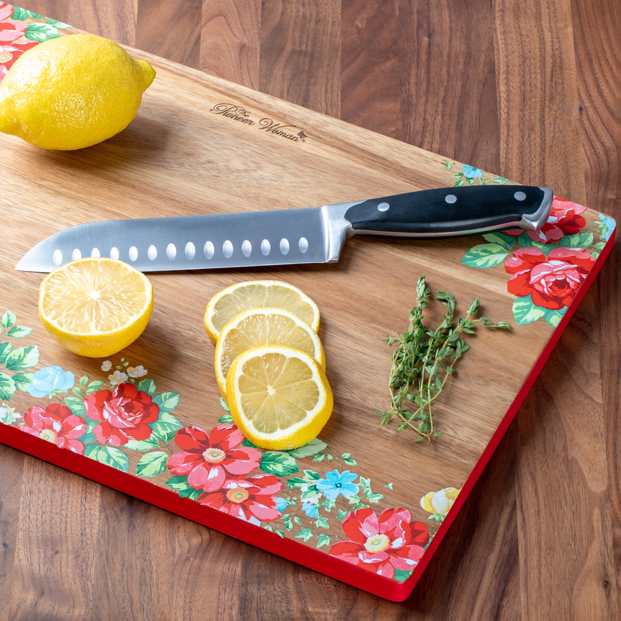 https://i5.walmartimages.com/seo/Pioneer-Woman-Vintage-Floral-12-x-18-Acacia-Wood-Cutting-Board-Red-Edge_255ee285-81e7-4a6b-9f75-37dfc78b70ad_2.bbaae6328145bbf593ce2476c634359b.jpeg