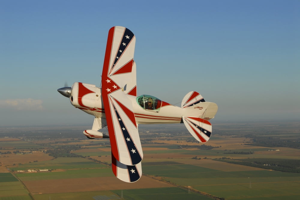 Pitts S-2A biplane flying over Vacaville California Canvas Art - Phil WallickStocktrek Images (17 x 12)