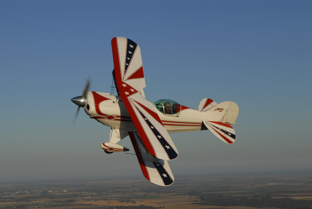 Pitts S-2A biplane flying over Vacaville California Canvas Art - Phil WallickStocktrek Images (34 x 23)