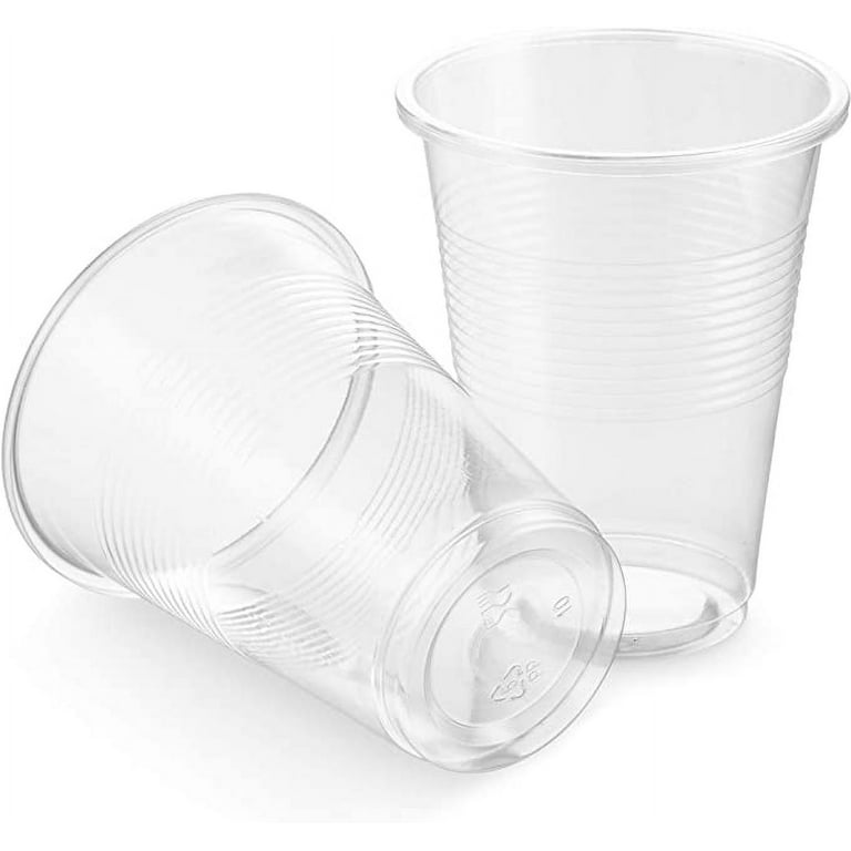 Disposeable plastic water cups on table for drinking at a road