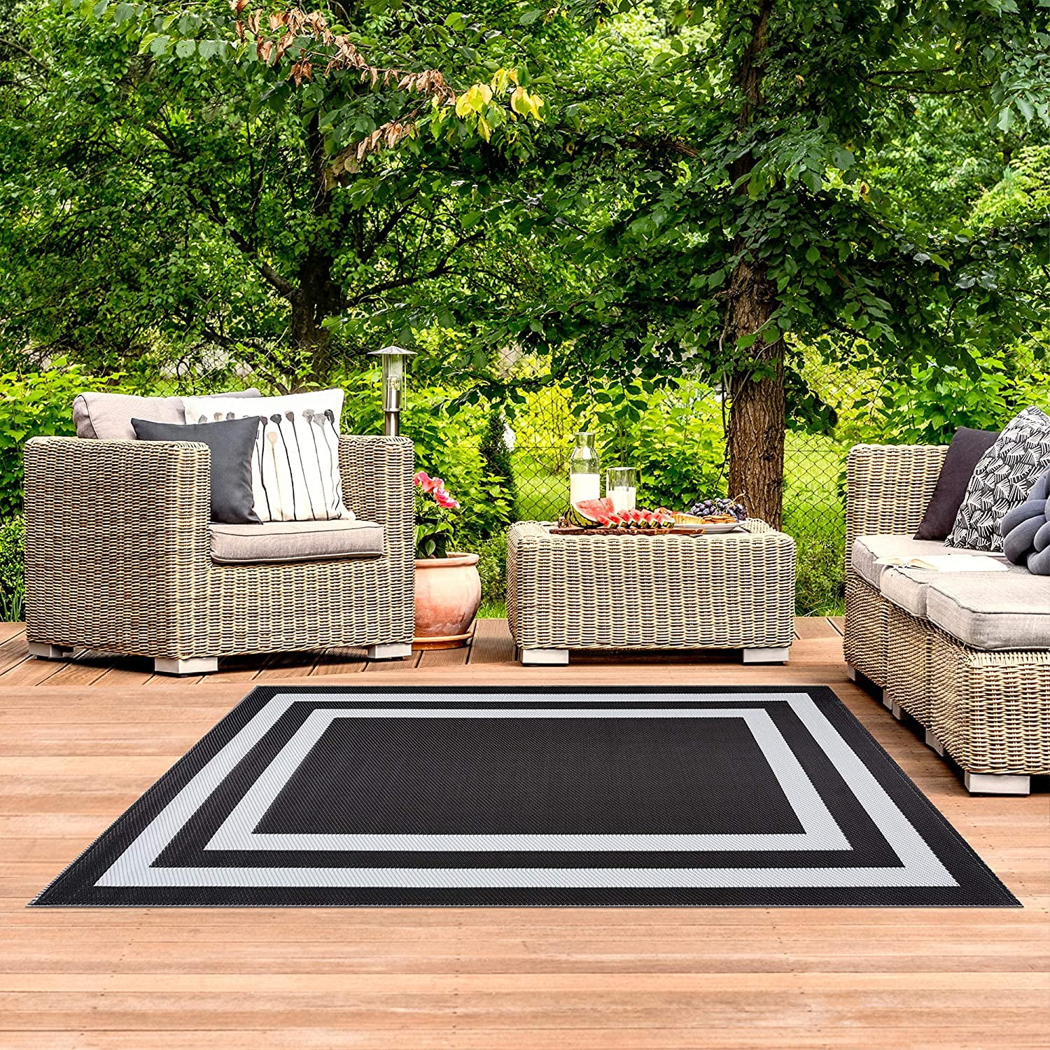 https://i5.walmartimages.com/seo/Playa-Rug-Reversible-Indoor-Outdoor-100-Recycled-Plastic-Floor-Mat-Rug-Weather-Water-Stain-Fade-and-UV-Resistant-Paris-Black-White-4-x6_19c485de-aa00-44d3-8829-79c982e8887a.2f34c7047eaf1f3e46e42bb2b9b35bc3.jpeg