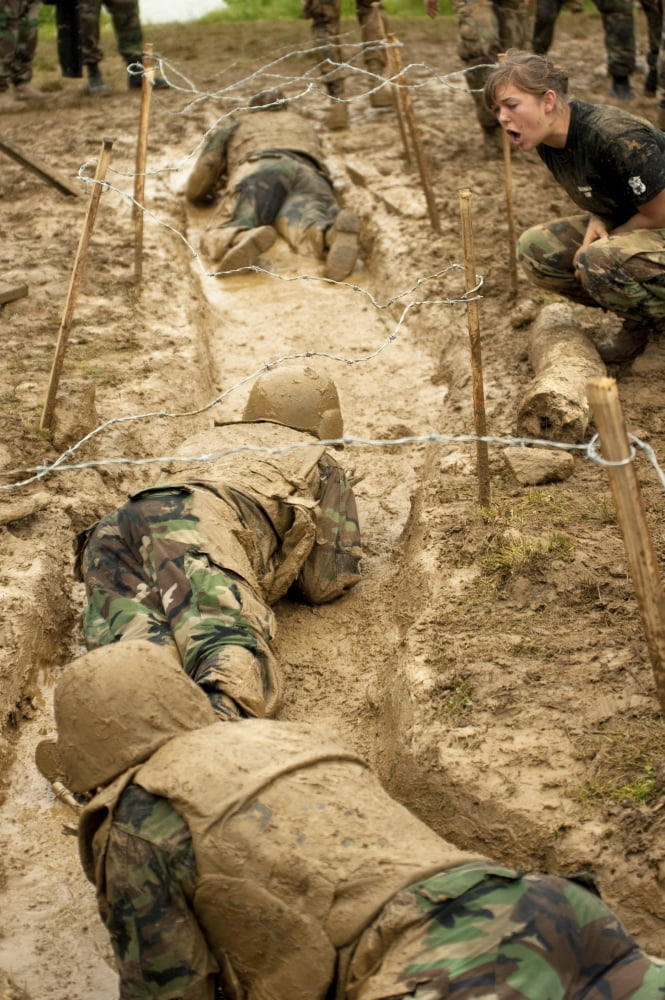 Plebes navigate the low crawl obstacle during Sea Trials at the US Naval Academy Canvas Art - Stocktrek Images (23 x 34)