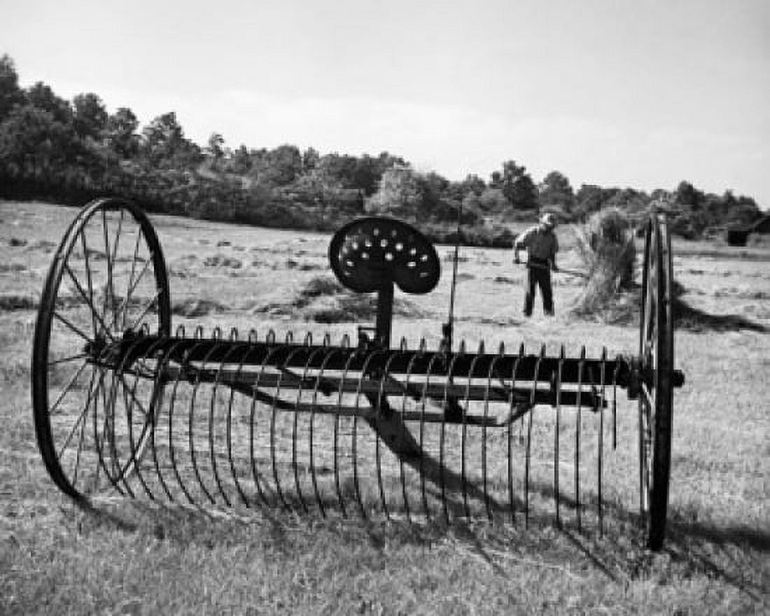 Plow in a hayfield Canvas Art - (24 x 36)
