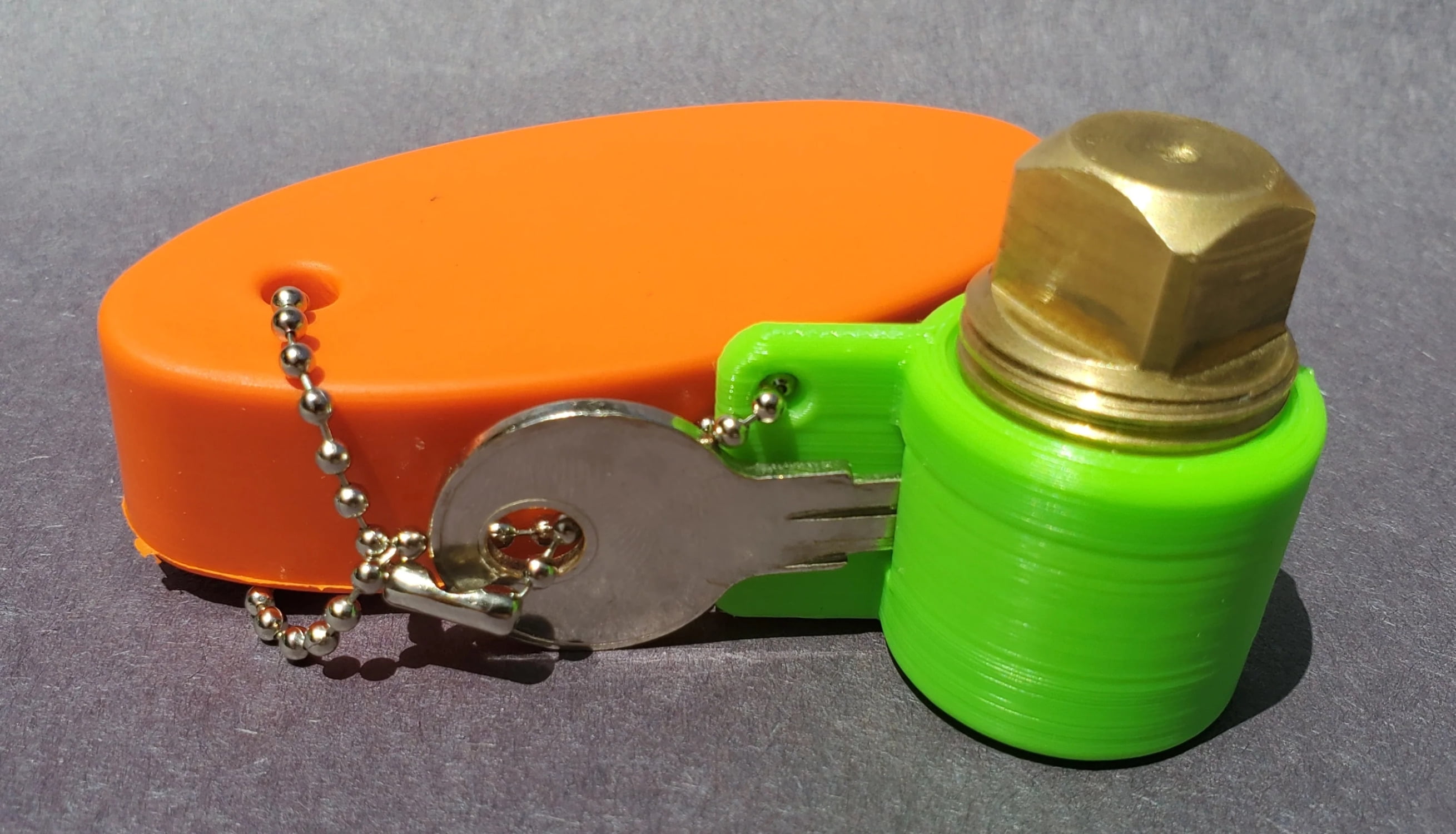 PlugKeyper (Green) boat drain plug reminder.