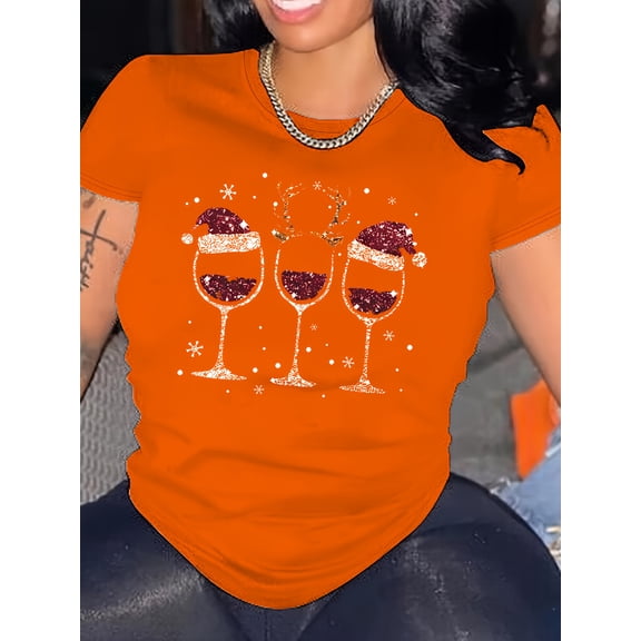Plus Size Women's Christmas Glitter Cup Graphic T-Shirt ,Christmas top with printed patterns of small snowflakes, reindeer antlers, and Christmas hats