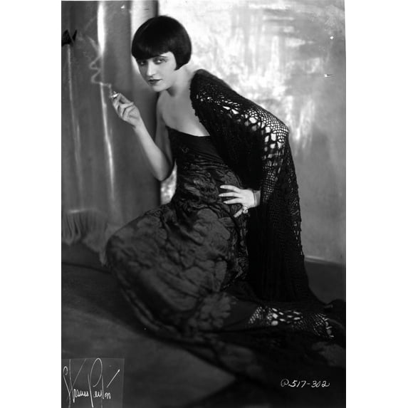 Pola Negri Kneeling on Floor with Embroidered Dress Photo Print (24 x 30)