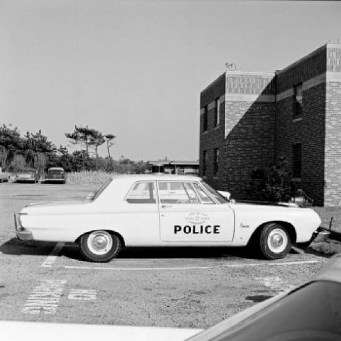 Police car in car park Canvas Art - (24 x 36)