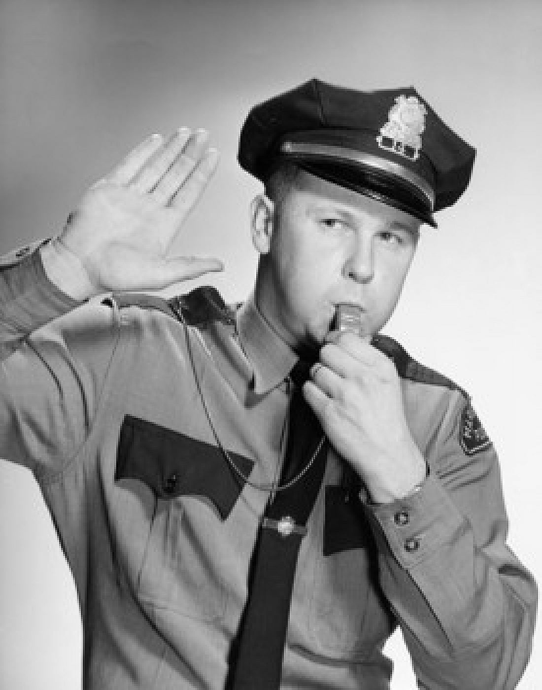 Police officer blowing a whistle and making a stop gesture Canvas Art - (24 x 36)