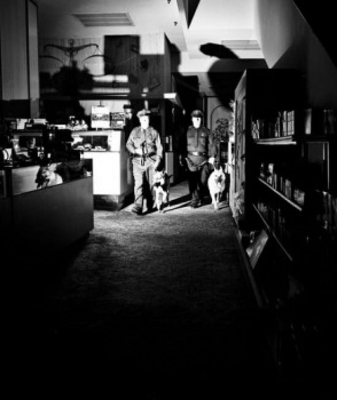 Police searching with police dogs in a building Canvas Art - (18 x 24)