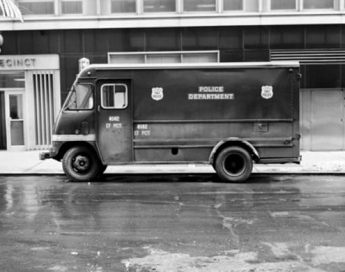 Police van parked in front of a building Canvas Art - (18 x 24)
