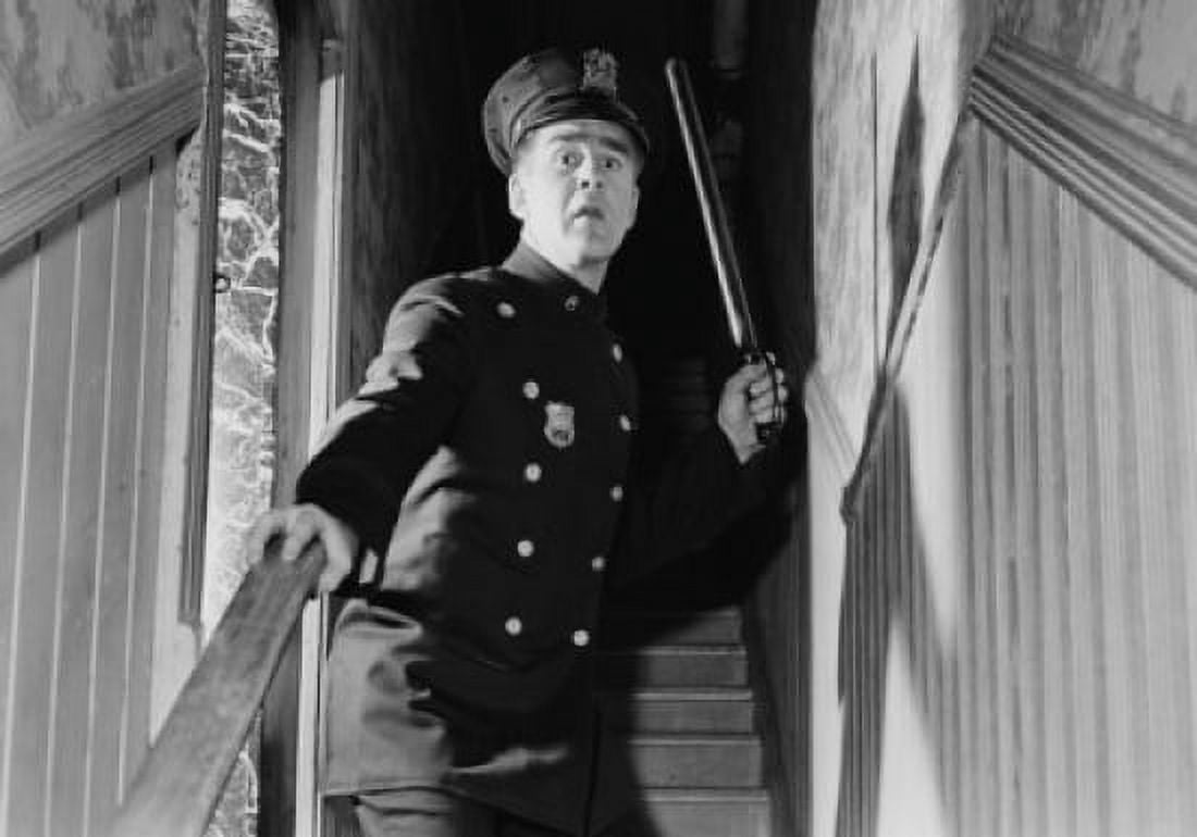 Policeman holding truncheon Canvas Art - (24 x 36)