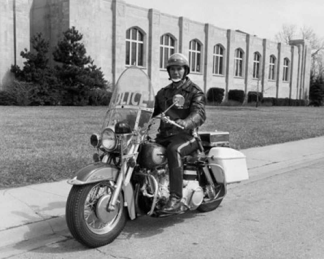 Policeman riding a motorcycle Canvas Art - (18 x 24)