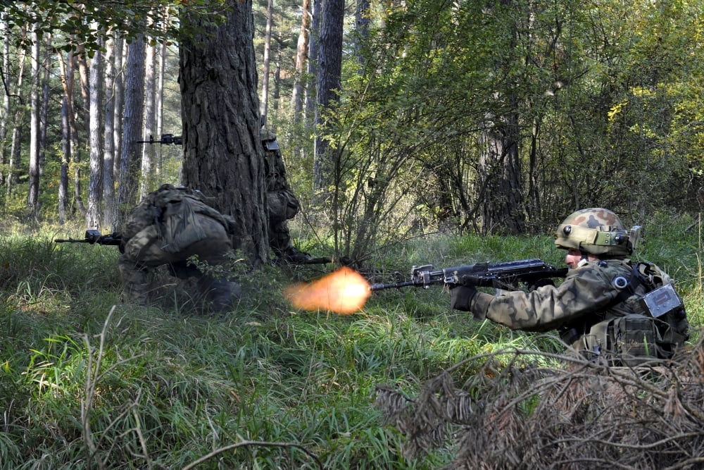 Polish soldiers engage in simulated combat Canvas Art - Stocktrek Images (34 x 23)