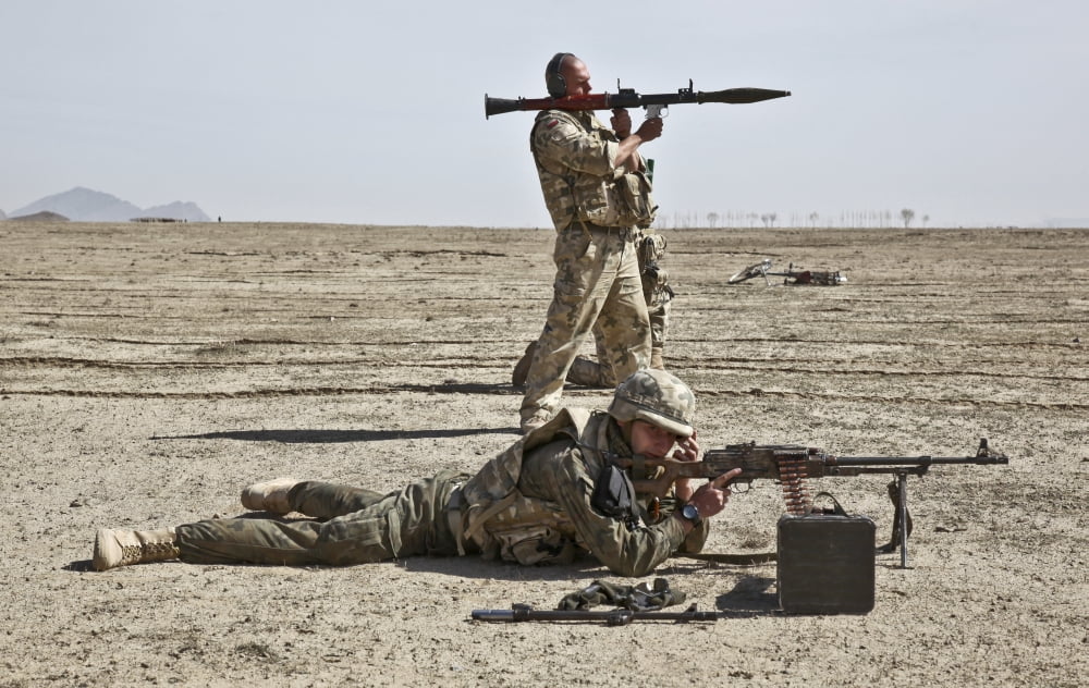 Polish soldiers prepare to fire their weapons down range Canvas Art - Stocktrek Images (35 x 22)
