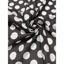 Polyester cotton geometric print, beautiful 60” wide, white and black polka dot print. Best used for apparel. Sold by the yard.