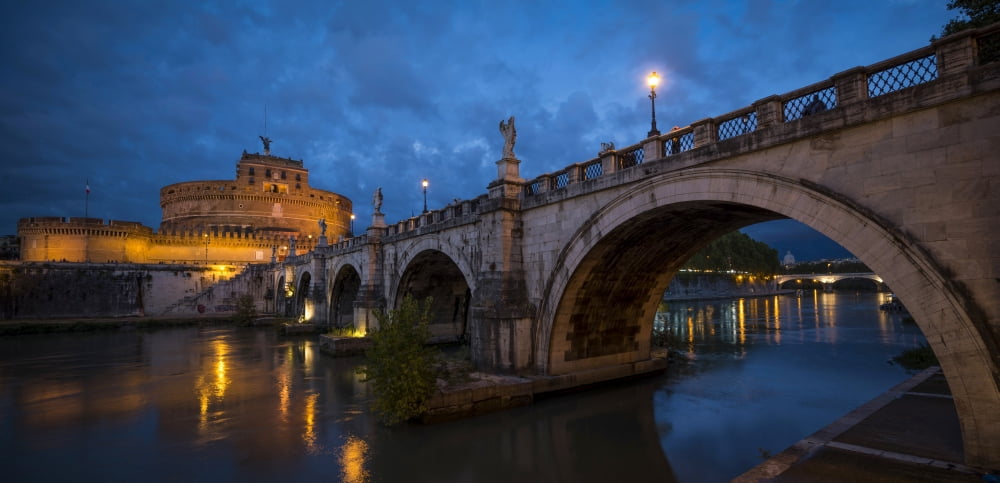 Ponte SantAngelo over river with Hadrians Tomb in the background Rome Lazio Italy Canvas Art - Panoramic Images (27 x 9)