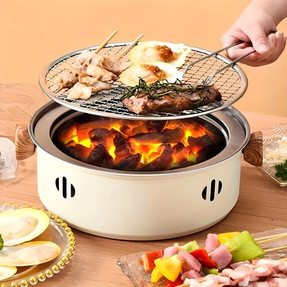 Portable Compact Tabletop Barbecue Grill Pan Made of Stainless Steel, Featuring a Grill Net And Designed for Household Use As a Split Charcoal Grill Stove.