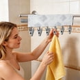 thumbnail image 1 of Portable Hanging Clothes Pegs, Foldable Travel Clothesline with 6 Clips for Socks & Underwear, 1 of 4