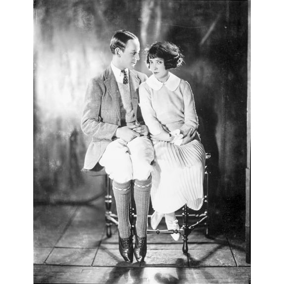 Portrait Fred Astaire sitting with a woman Photo Print (8 x 10)