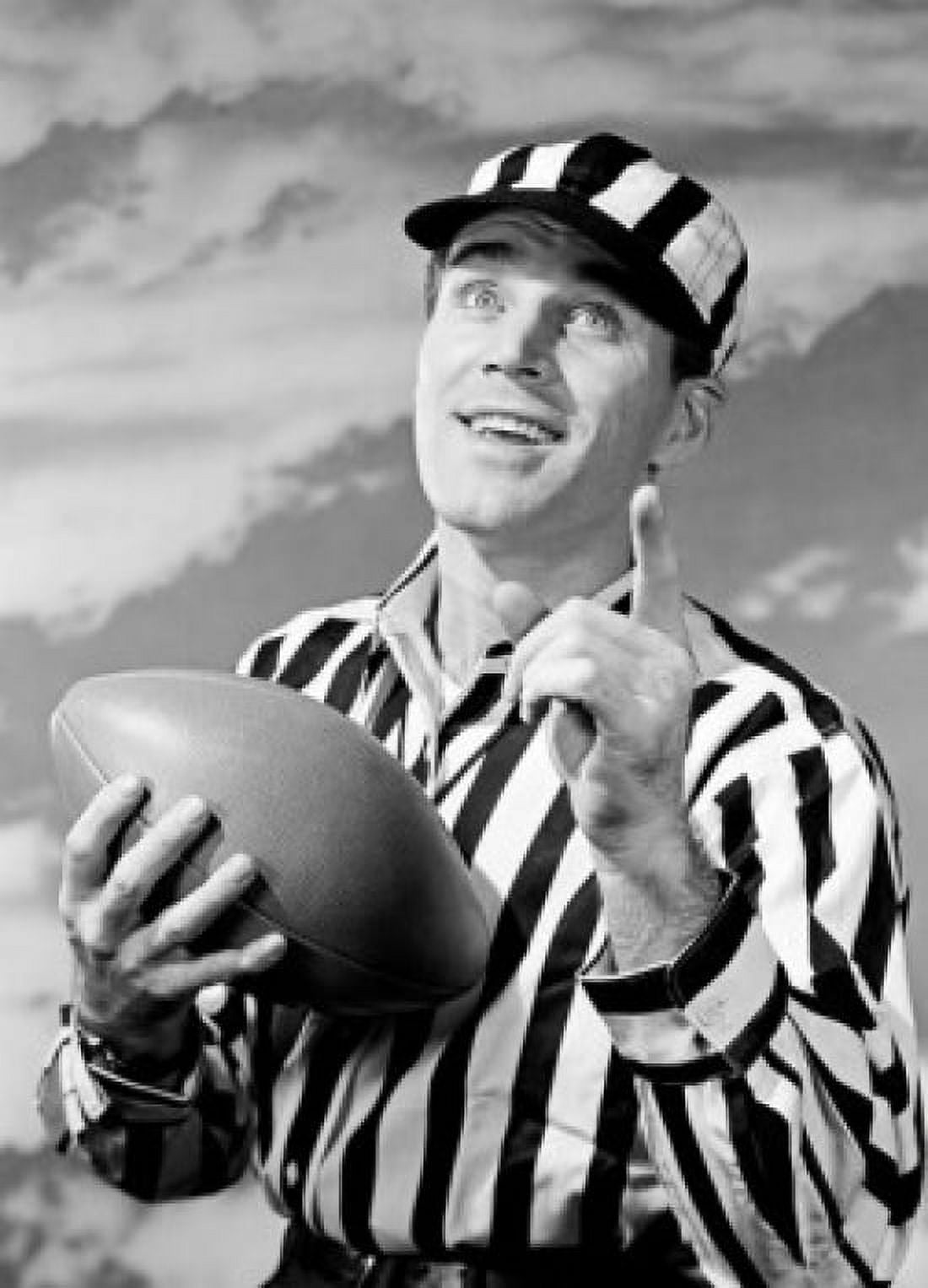 Portrait of American football referee holding ball pointing up Canvas Art - (18 x 24)