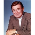 thumbnail image 1 of Portrait of Arthur Godfrey Posed in Coat with Blue Background Photo Print (8 x 10), 1 of 1