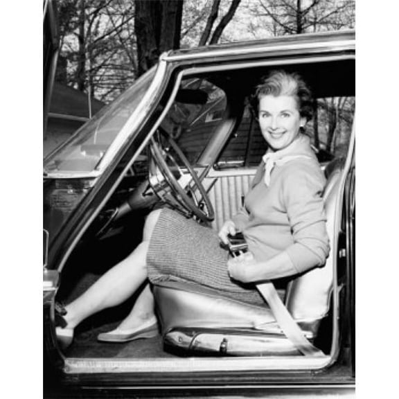 Portrait of a Mid Adult Woman Her Strapping Seat Belt in a Car Poster Print - 18 x 24 in.