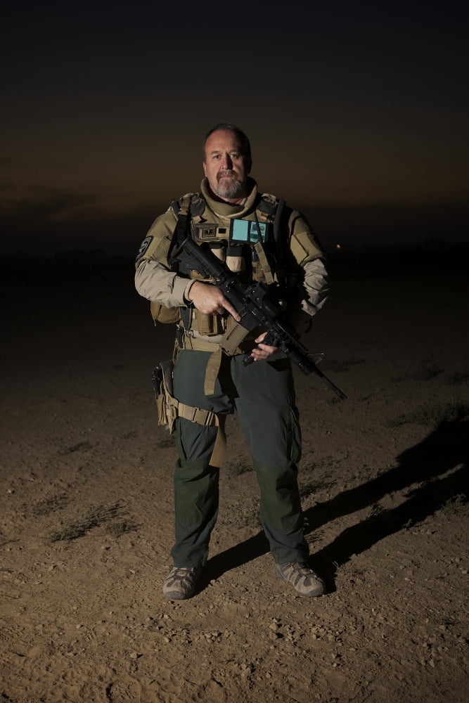 Portrait of a US Contractor on a police mission in Afghanistan Canvas Art - Terry MooreStocktrek Images (12 x 18)