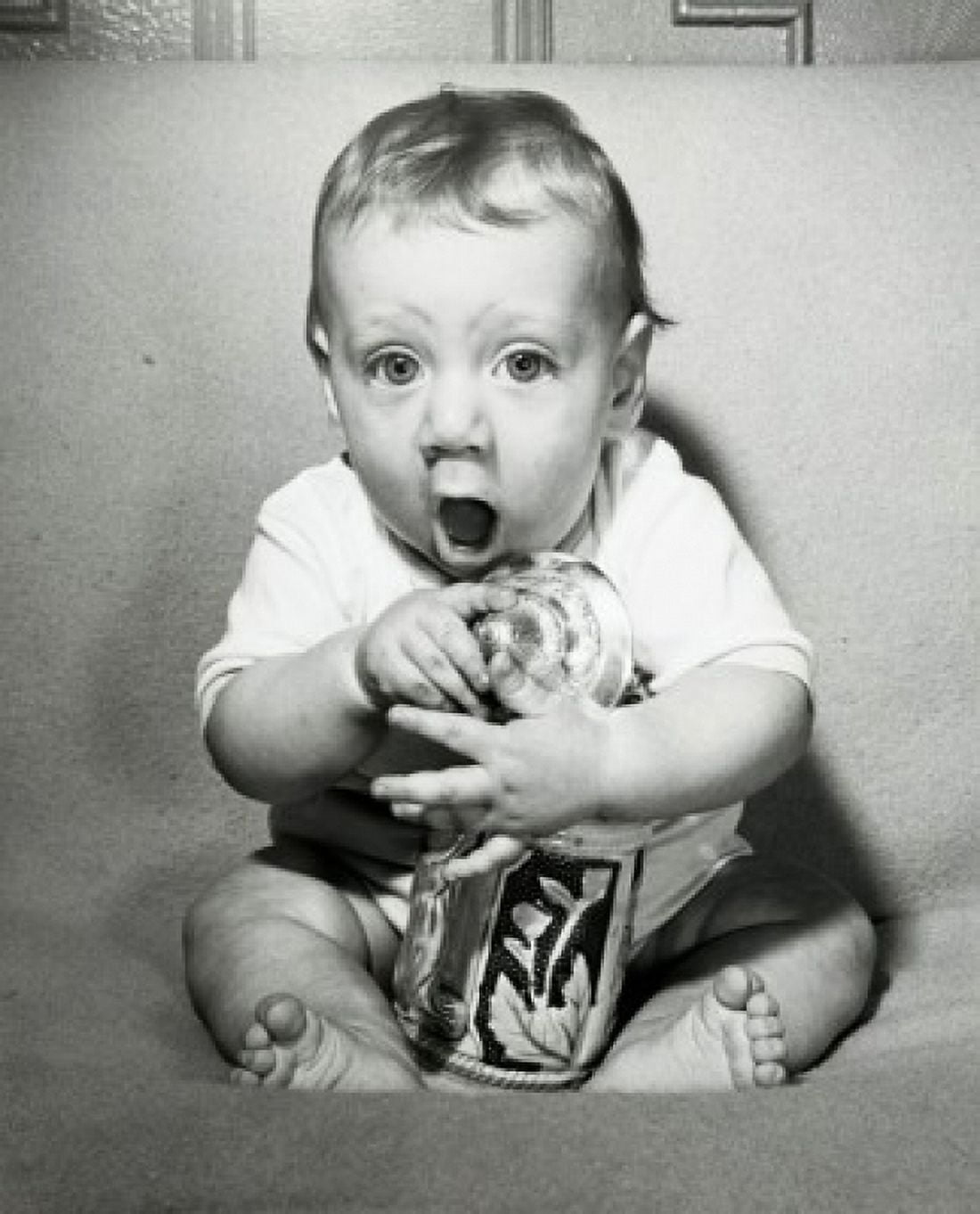 Portrait of a baby boy holding a jar Canvas Art - (18 x 24)