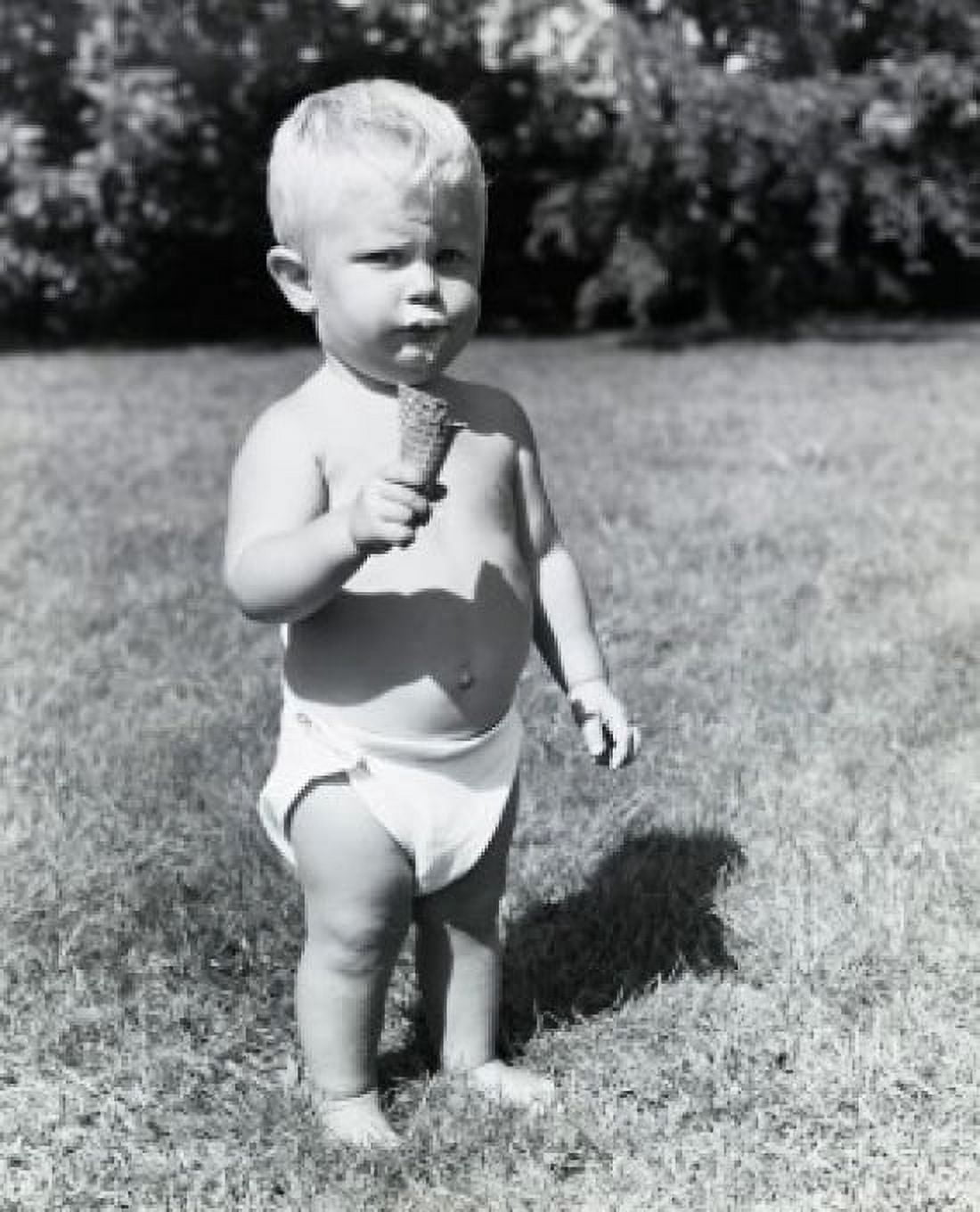 Portrait of a baby boy holding an ice cream cone Canvas Art - (18 x 24)