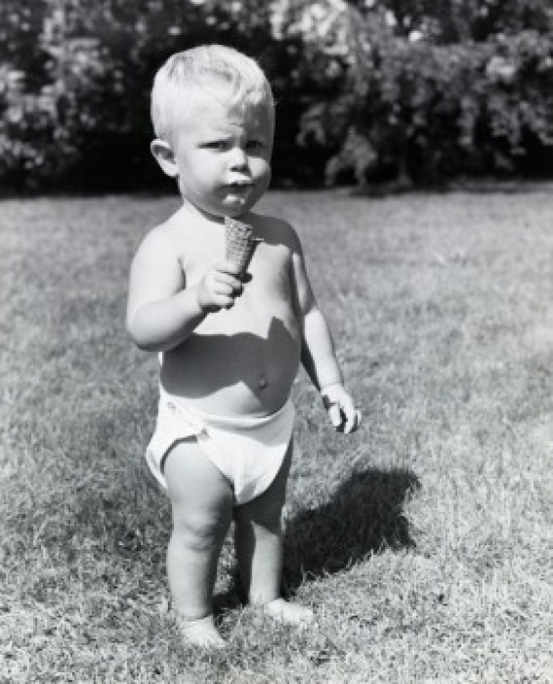 Portrait of a baby boy holding an ice cream cone Canvas Art -  (24 x 36)