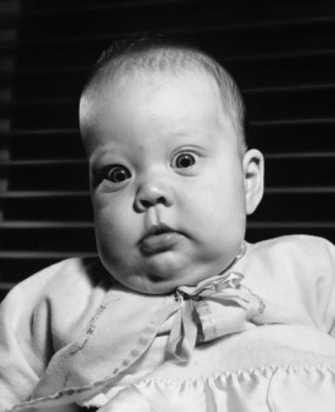 Portrait of a baby girl staring Canvas Art - (24 x 36)